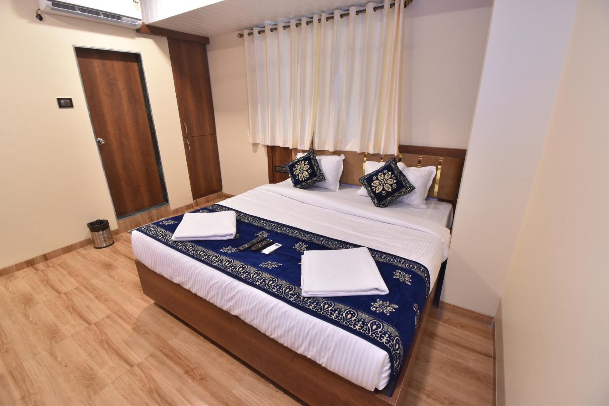 Hotel Starlit Navi Mumbai Quarto foto